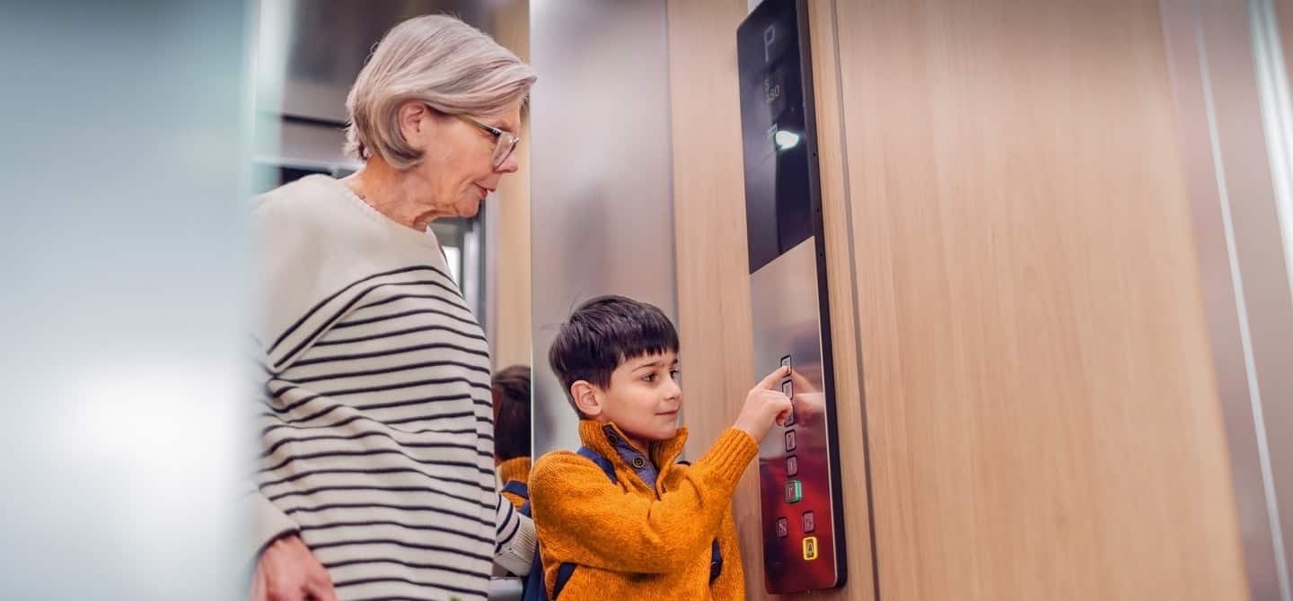 img_grandma-boy-elevator-residential_1440x670